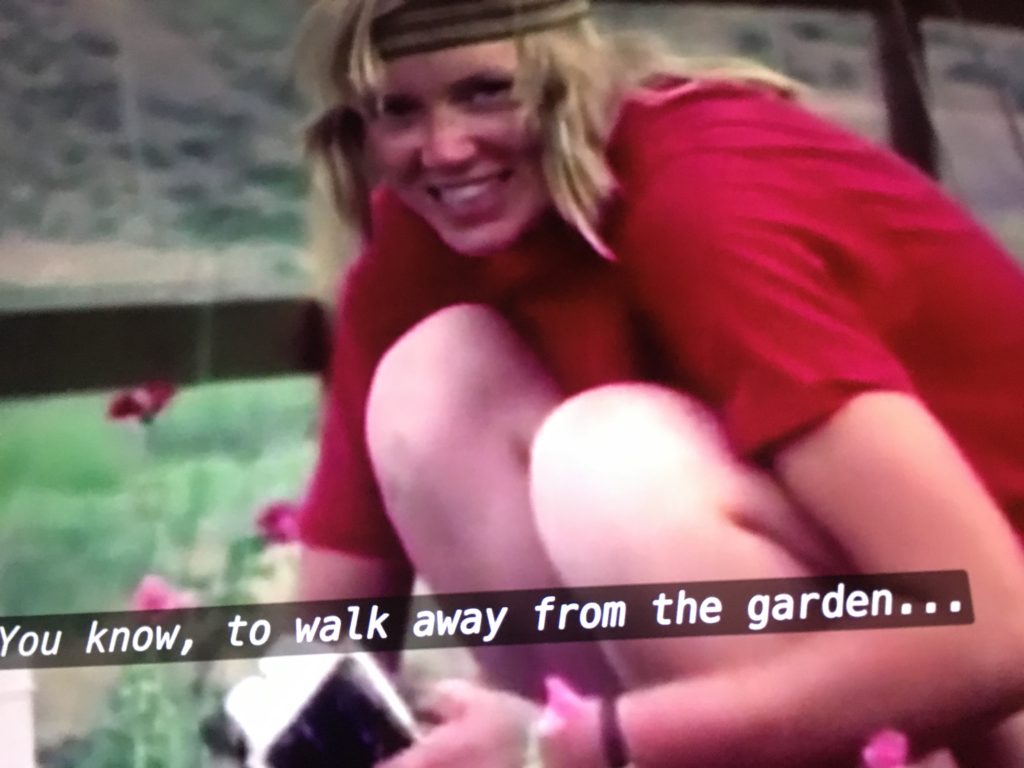 Samvedam planting flowers in a photo taken at age 23.